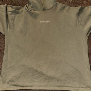 A few spots on the hoodie. Not noticeable really. Photo was taken with flash.